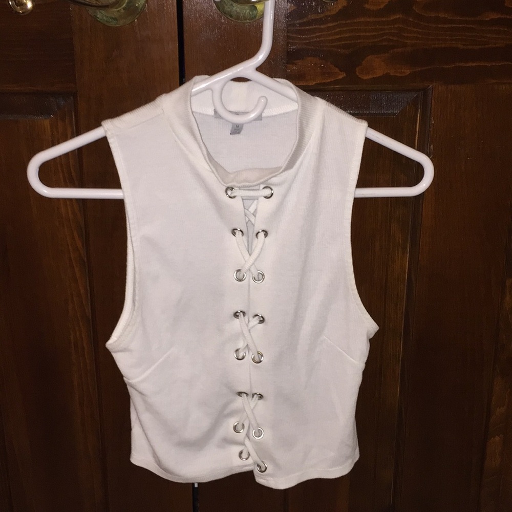 White sleeveless crop top. Size M